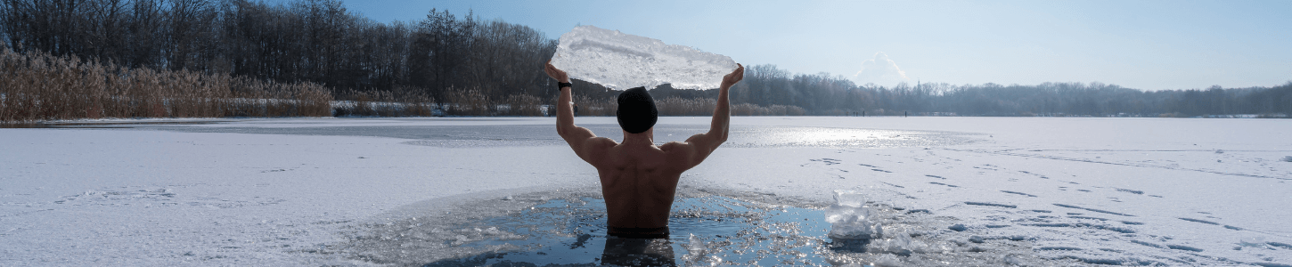 guy in ice lifting ice block